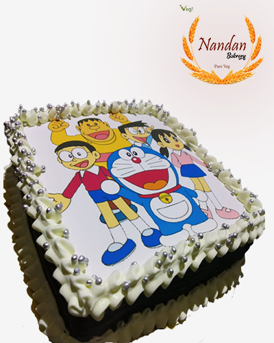 Doraemon theme cake 2k.g pineapple